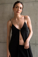 Blusa larga fluida de tirantes con nudo escote