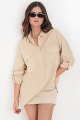 Camisa de lino oversized con bolsillos frontales