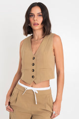 Chaleco corto recto con vivos botones