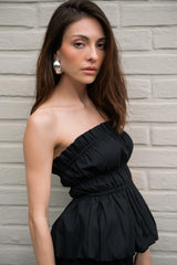 Top strapless plisado con peplum globo