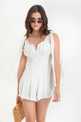 Playsuit de tirantes con nudo escote v plisados