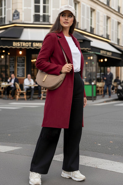 Abrigo abierto de gamuza, fit recto, con solapa, manga larga y bolsillos delanteros ocultos.