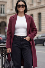 Abrigo textura botón