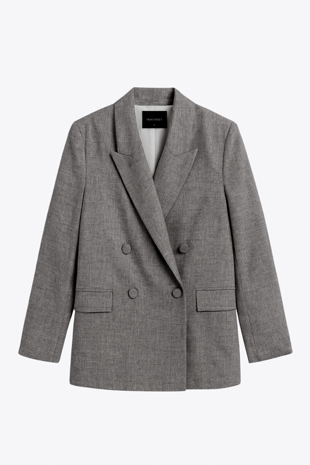 Blazer cruzado de fit oversized, con solapa y hombreras, manga larga, bolsillos delanteros con cartera y cierre frontal con cruce de botones.