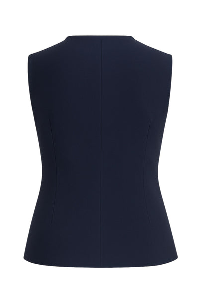 Blusa de fit ajustado, cuello redondo, sin mangas y cierre frontal con lazos amarrables. Detalle de bajo curveado frontal.