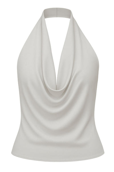 Blusa corta de cuello halter, escote fluido frontal y en espalda.