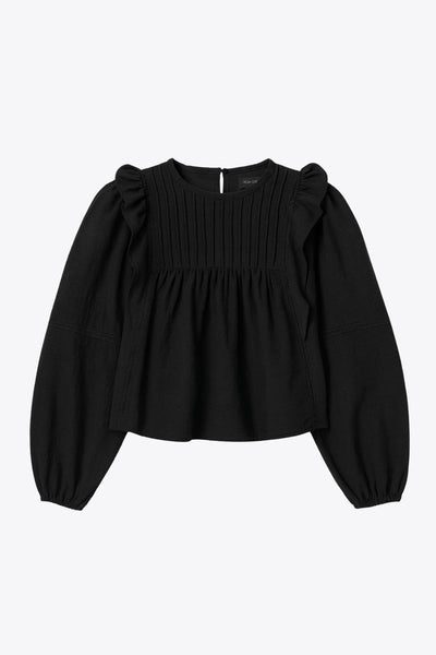 Camisa de fit amplio, costuras decorativa frontales con plisados, manga larga abullonada con rib elástico en puños, cuello redondo, olanes decorativos en sisa, cierre posterior con botón y ojal.