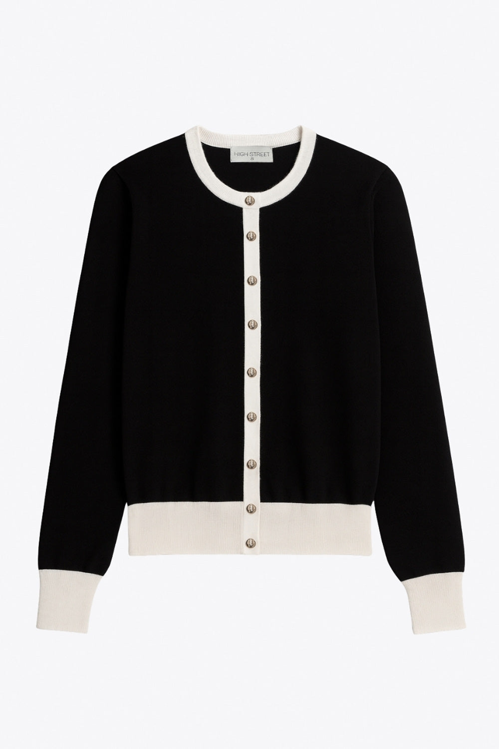 Cardigan de punto, fit recto, manga larga con rib de contraste en puños, bajo y cuello redondo. Cierre frontal con hilera de botones en contraste.