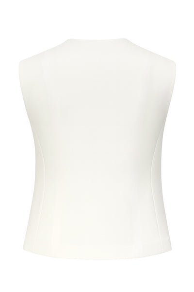 Chaleco asimétrico de recto, escote v, vivos decorativos delanteros y cierre frontal con hilera de botones en diagonal. Detalle de bajo asimétrico.