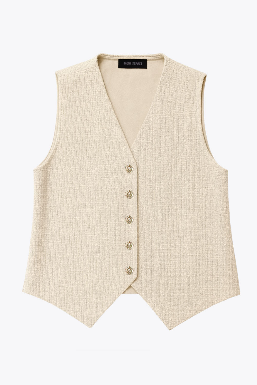 Chaleco de bouclé, fit recto, escote v, cierre con hilera de botones en contraste y abertura frontal v en bajo.
