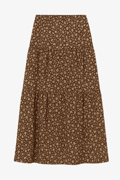 Falda midi de estampado floral, cintura alta con pretina elástica, corte en a y capas de olanes en bajo.