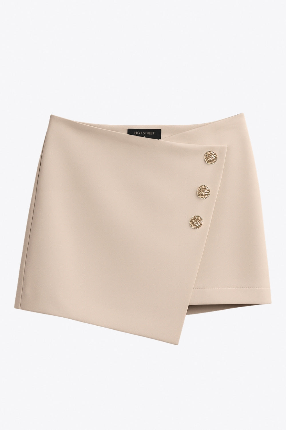 Falda short corto de fit ajustado, cintura alta, cruce frontal con nudo y plisados decorativos frontales. Cierre posterior con cremallera oculta.