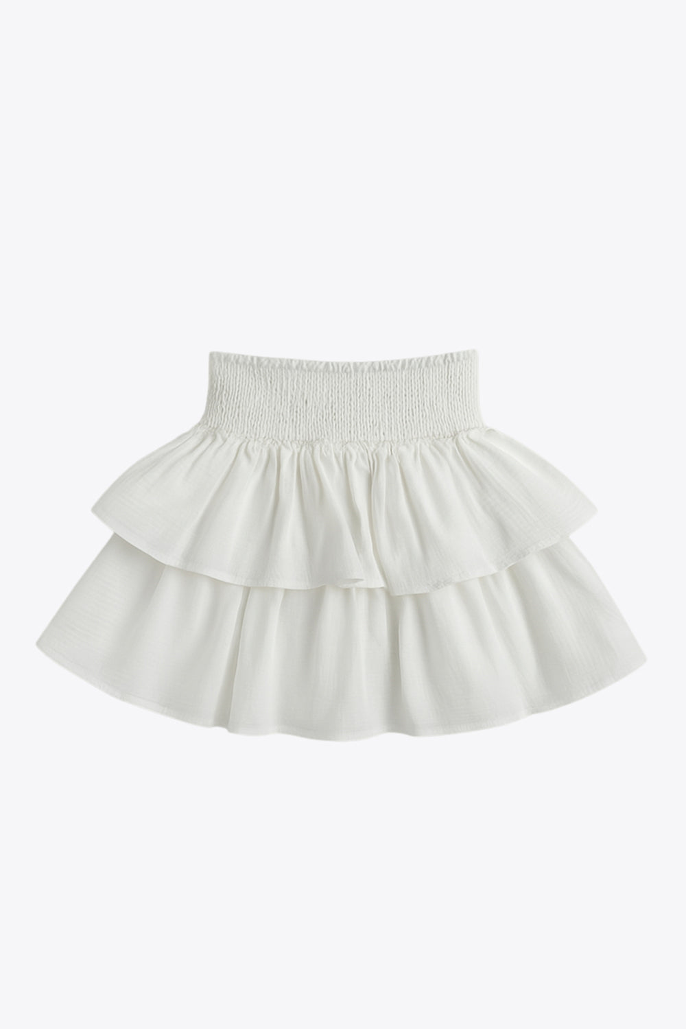 Falda short de corte en a, cintura alta elástica con pretina fruncida y capas de olanes en bajo.