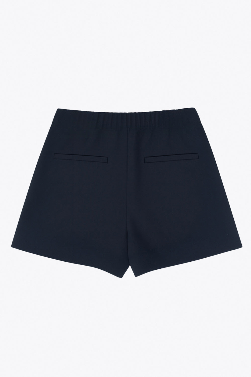 Falda short corto de cintura alta con pinzas y tableado frontal, corte en a, vivos decorativos posteriores y cierre lateral con cremallera oculta.