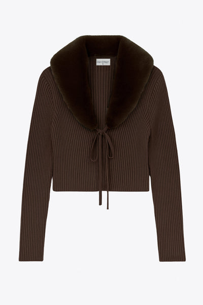 Jersey corto canalé de fit recto, manga larga, cuello v con solapa desmontable de efecto pelo y cierre frontal lazo amarrable.