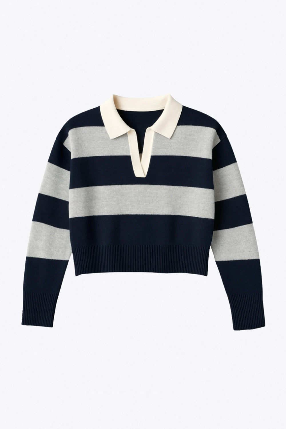 Jersey corto de punto, estampado rayas, fit recto, manga larga con rib en puño y escote v con cuello polo en contraste.