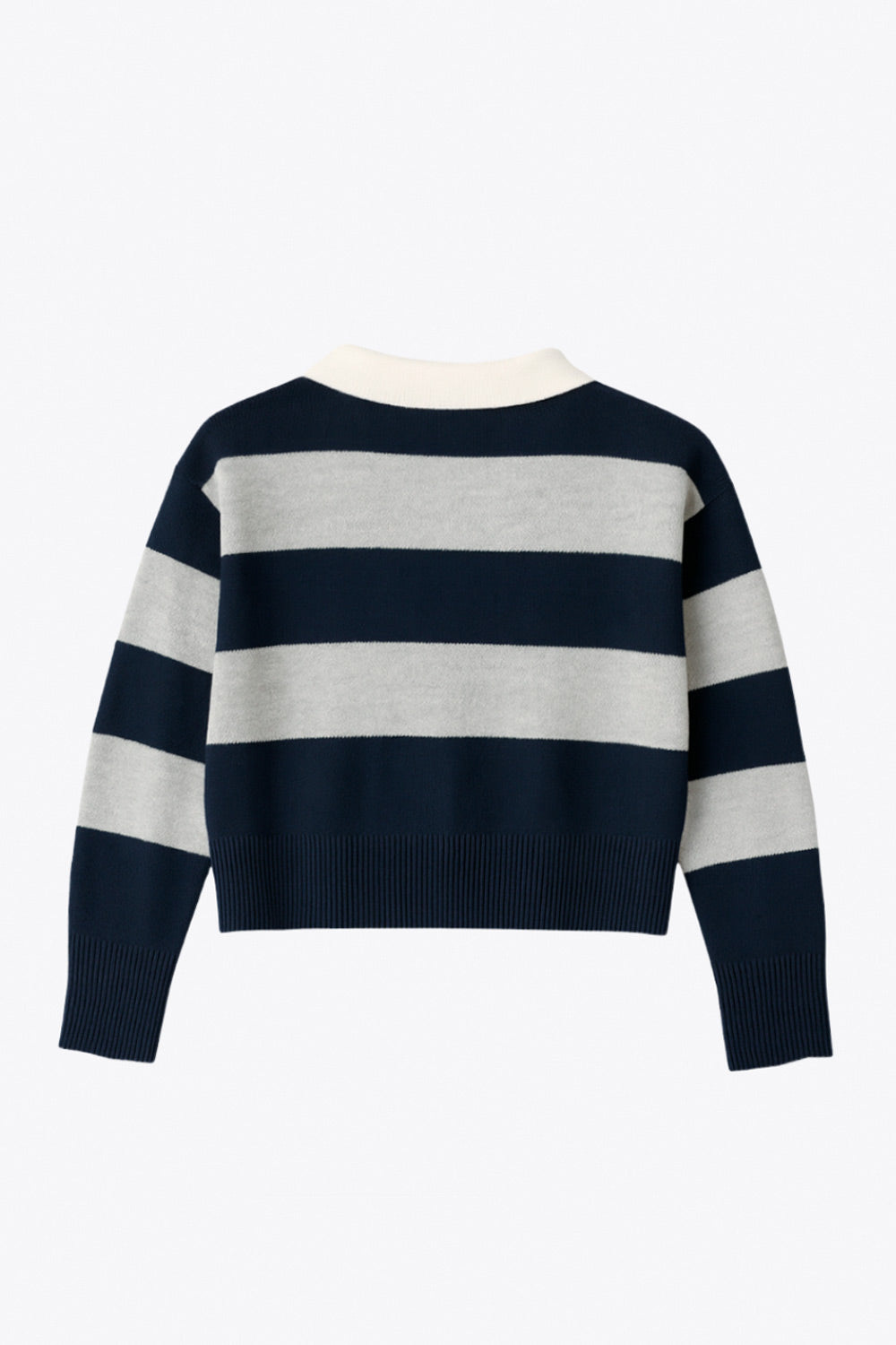 Jersey corto de punto, estampado rayas, fit recto, manga larga con rib en puño y escote v con cuello polo en contraste.