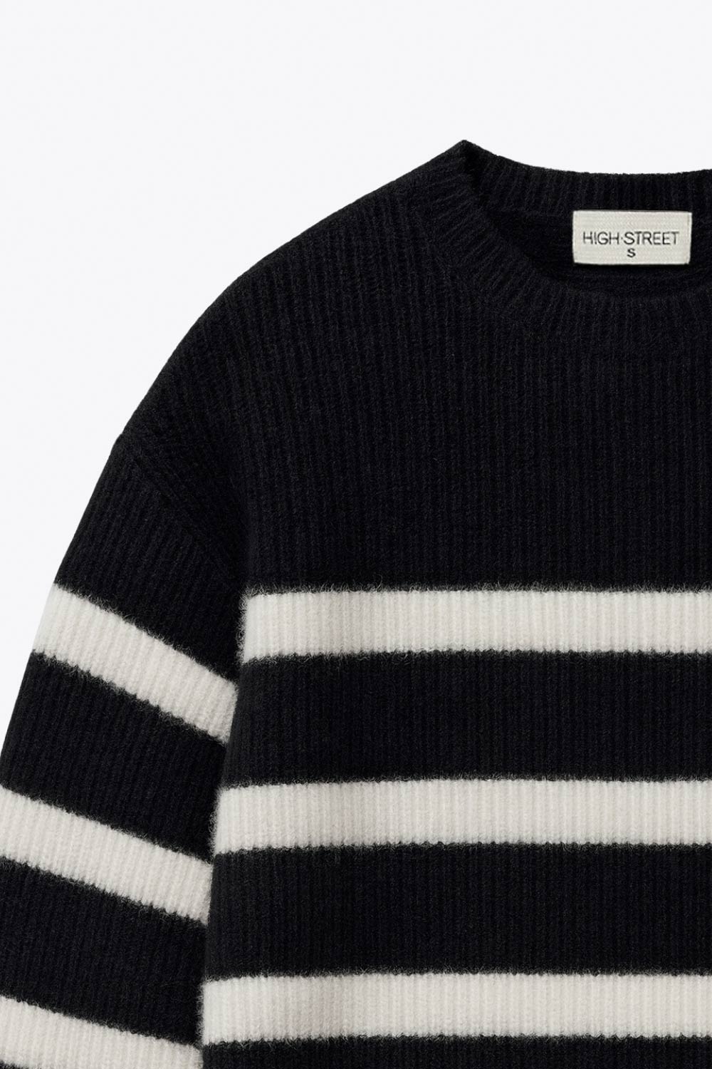 Jersey de punto, estampado rayas, fit oversized, manga larga con rib en puños y cuello redondo.