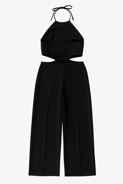 Palazzo ajustado de fit wide leg, cuello halter con lazo amarrable posterior, cut out en costados y espalda. Detalle de fruncido en espalda.