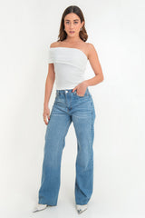 Pantalón denim fit flare con rotos