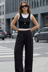 Pantalón fluido cintura alta wide leg con pinzas