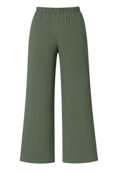 Pantalón de fit fluido, bolsillos delanteros, cintura media con pretina elástica y jareta frontal ajustable.