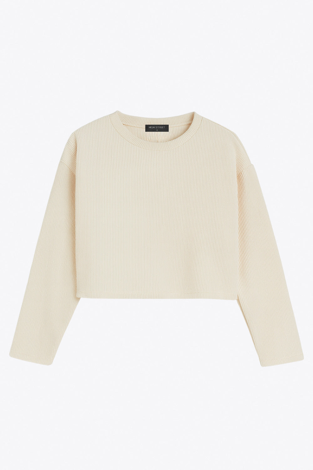 Jersey básico de punto, fit recto, cuello redondo y manga larga de hombro caído.