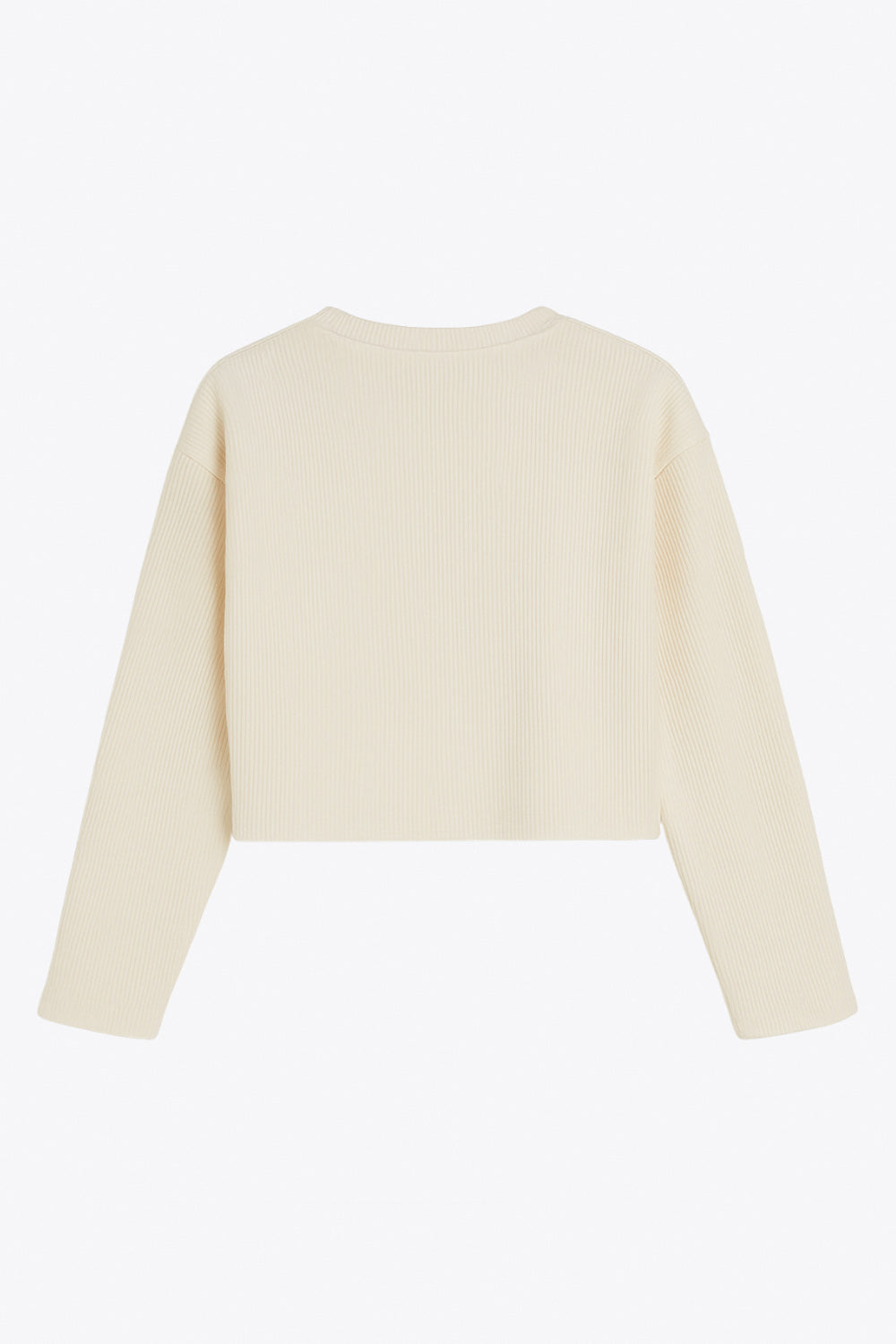 Jersey básico de punto, fit recto, cuello redondo y manga larga de hombro caído.