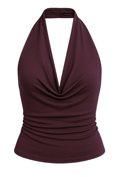 Top corto ajustado de cuello halter con escote fluido, sin mangas, escote en espalda, cierre posterior con botón y ojal.