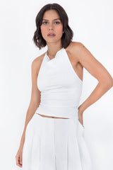Top corto cuello halter fluido escote espalda