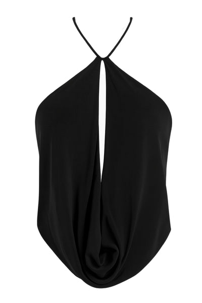 Top corto halter con lazo posterior, sin mangas, cut out frontal con cruce y fit fluido. Escote en espalda y cierre posterior con nudo amarrable.