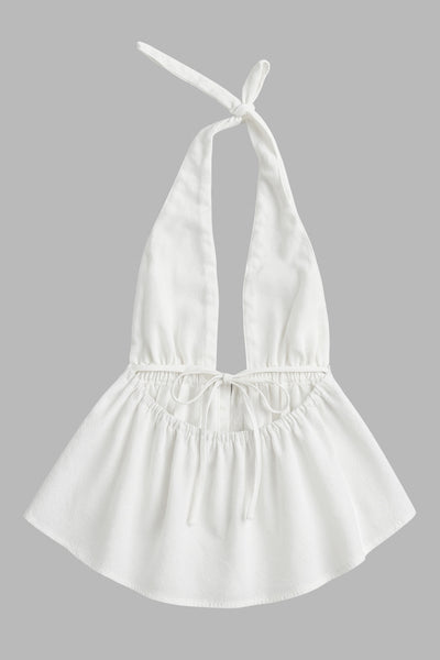 Top de cuello halter con nudo amarrable posterior, escote v con plisados frontales, rib elástico en cintura y peplum olanes. Detalle de escote en espalda con lazo amarrable posterior.