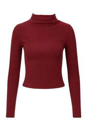 Top canalé de fit ajustado, cuello mock seguido y manga larga.