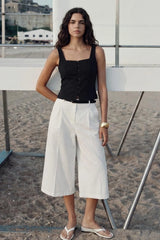Sleeveless top with front buttons