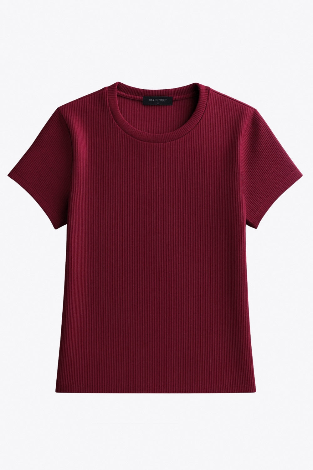 Top canalé de fit ajustado, manga corta y cuello redondo con rib en borde.