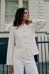 Long-sleeve button-up blouse