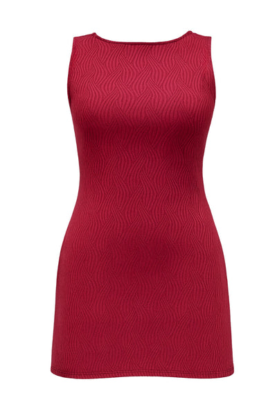 Vestido corto de fit recto, sin mangas, cuello barco y escote en espalda con lazo amarrable posterior. Detalle de textura en tejido.