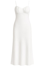 Vestido midi de fit recto, escote curveado con detalles plisados y corte frontal, tirantes delgados ajustables y cut out con nudo en espalda. Cierre posterior con cremallera oculta.
